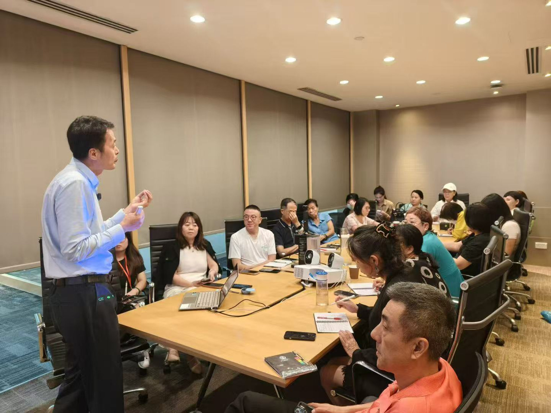 Business professionals learning AI tools in classroom setting